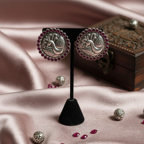 Ruby‑bordered Silver Peacock Studs