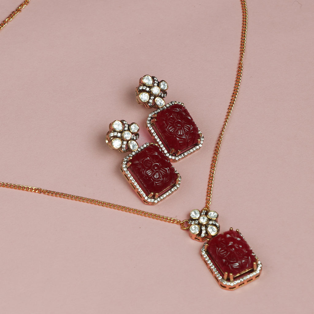 Regal Ruby Carved Pendant Set