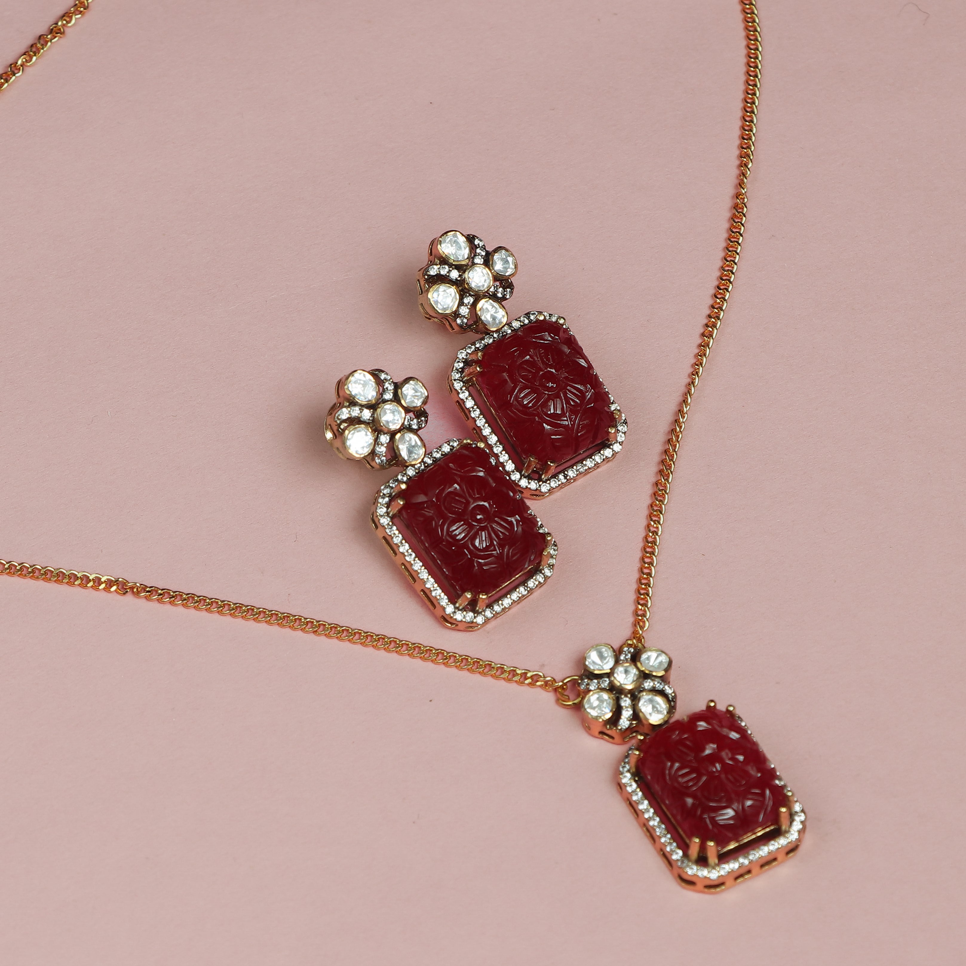 Regal Ruby Carved Pendant Set