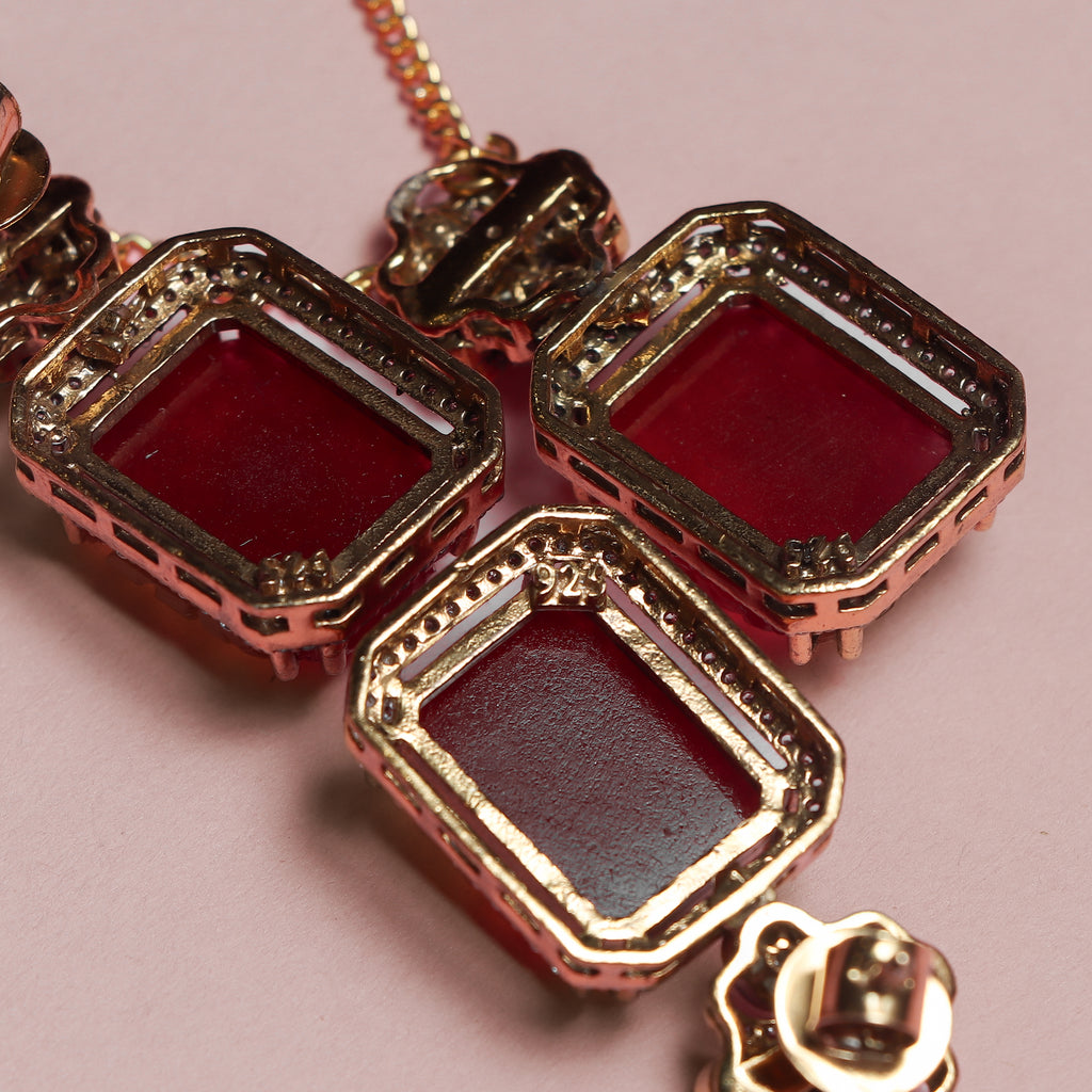 Regal Ruby Carved Pendant Set
