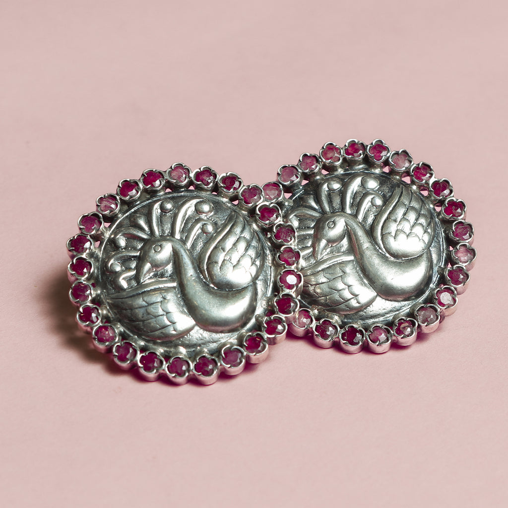 Ruby‑bordered Silver Peacock Studs