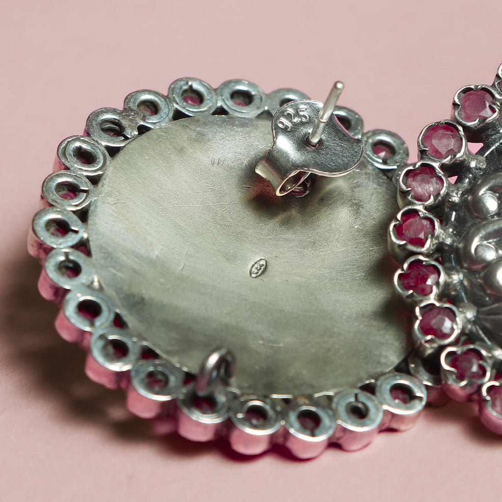 Ruby‑bordered Silver Peacock Studs